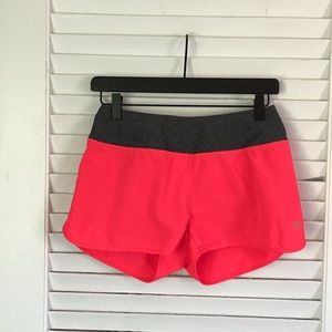 hot pink running shorts